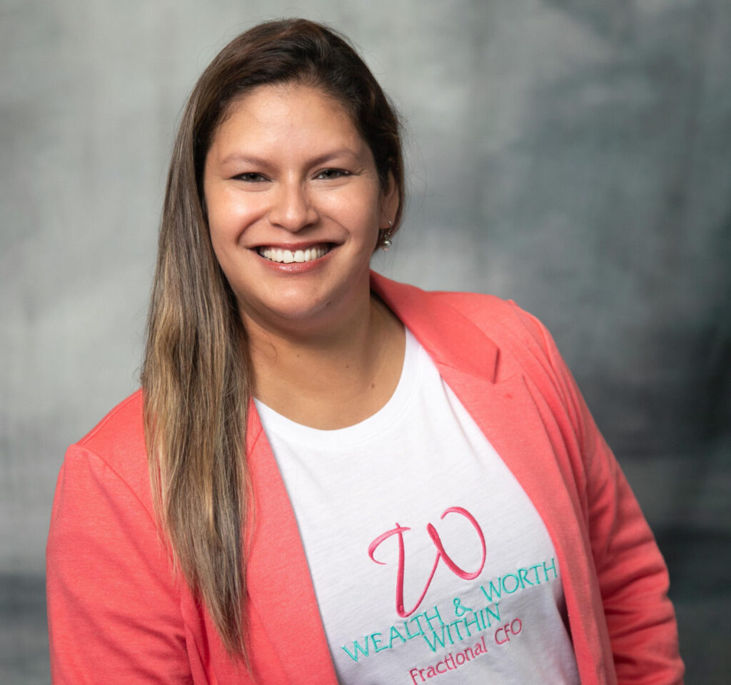 Carla is smiling ready to help group practice owners feel confident with their finances.